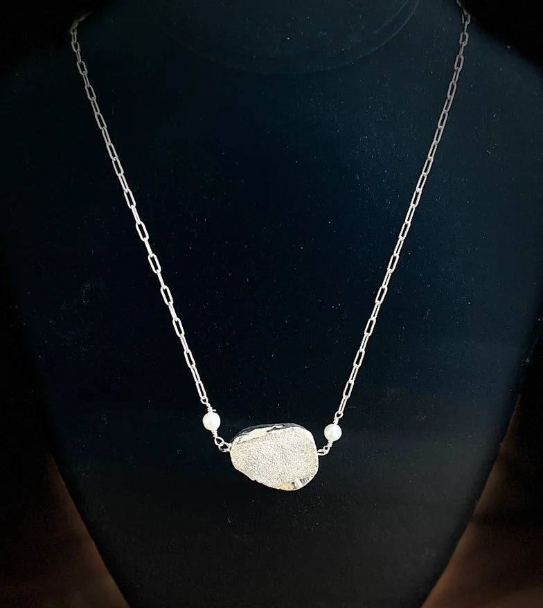 Stuck Between Two Pearls